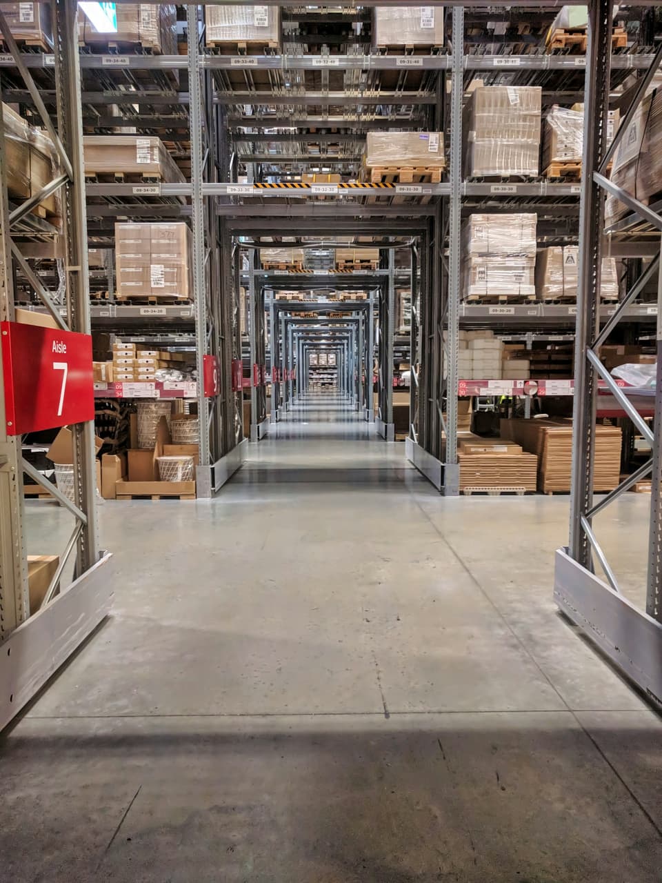 Organised storage with neatly stacked cargo in a warehouse